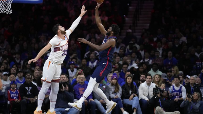Embiid scores 26 and Oubre 25 as the 76ers beat the Suns 112-100 for their 4th straight win