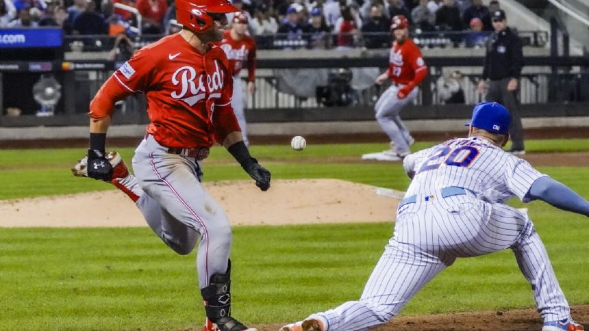 Encarnacion-Strand's 2-run homer lifts the Reds over the Mets 3-2