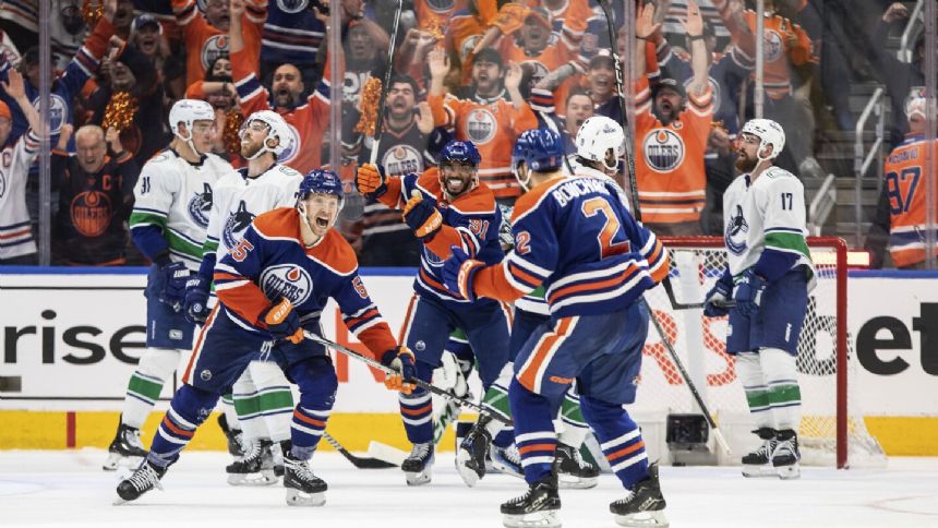 Evan Bouchard scores late winner as Oilers edge Canucks 3-2, tying the series at 2 apiece