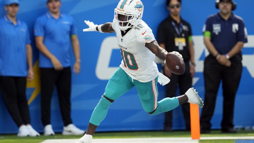 Extra work and familiarity with the Dolphins' system are helping Tyreek Hill excel