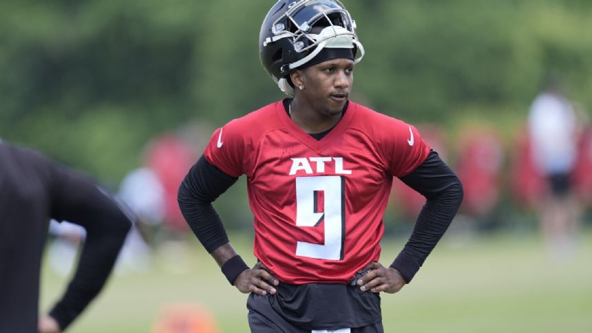 Falcons rookie QB Michael Penix Jr. says he is 'super blessed' to learn behind starter Kirk Cousins