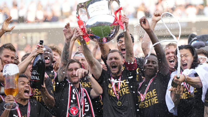 FC Midtjylland wins Danish league after final-day slip-up by Brondby. Kristoffer Olsson in the crowd