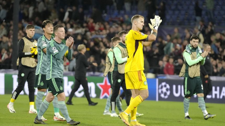 Feyenoord overcomes 9-man Celtic 2-0 in Champions League opener