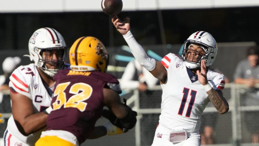 Fifita throws for 527 yards, No. 16 Arizona blows out rival Arizona State 59-23