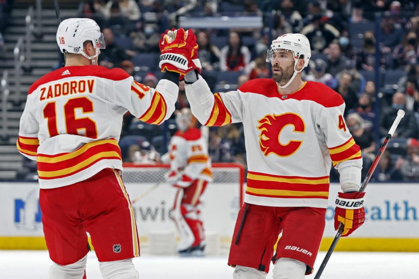 Flames fire record 62 shots on goal, rout Blue Jackets 6-0