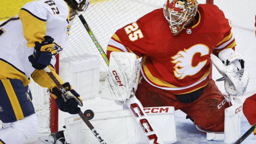 Flames rally with three goals in third to beat Predators 4-2