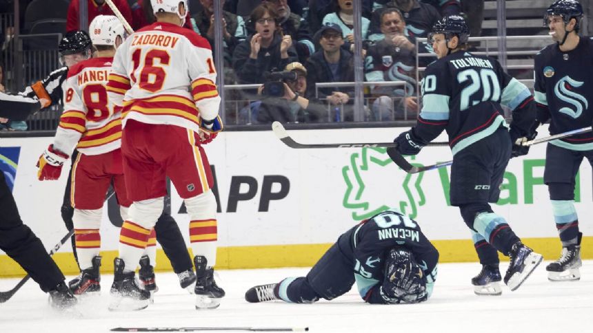 Flames' Mangiapane suspended 1 game by NHL for cross-checking Kraken's McCann