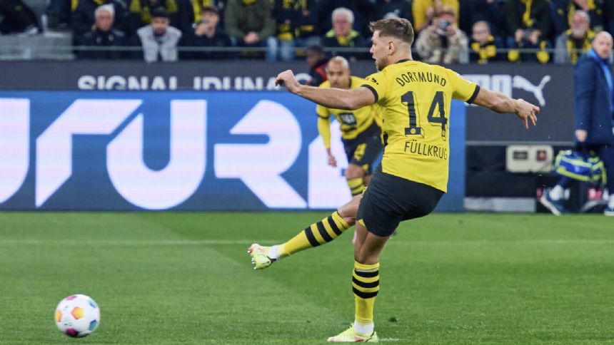 Fullkrug scores hat trick as Dortmund beats Bochum 3-1 to continue its winning run in Bundesliga