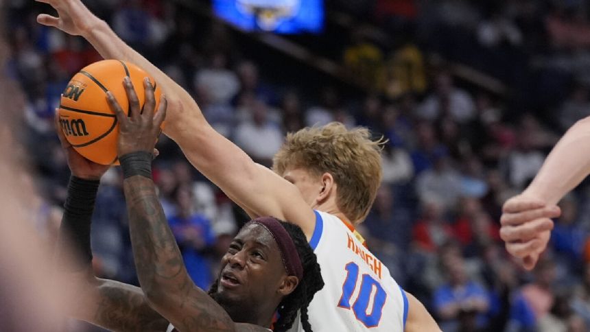 Florida reaches SEC final rallying from 18 down to beat Texas A&M 95-90