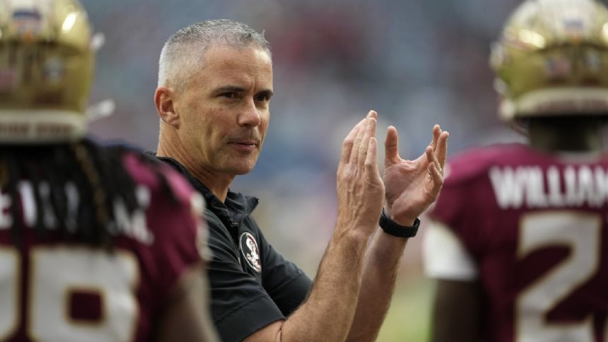 Florida State, coach Mike Norvell agree to 8-year deal at more than $10M per year, AP source says