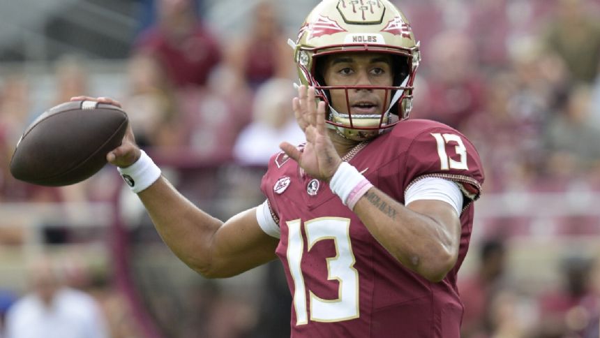 Florida State QB Jordan Travis leaves game before halftime, returns for 3rd quarter after injury