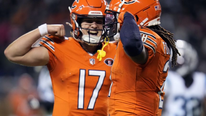 Foreman runs for TD, Bears beat Panthers 16-13 to boost their shot at the top pick in the draft