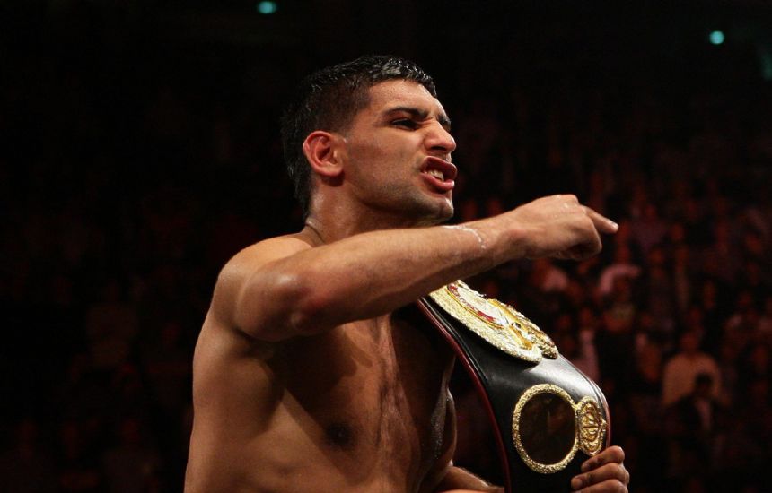 Former champion Amir Khan announces retirement from boxing