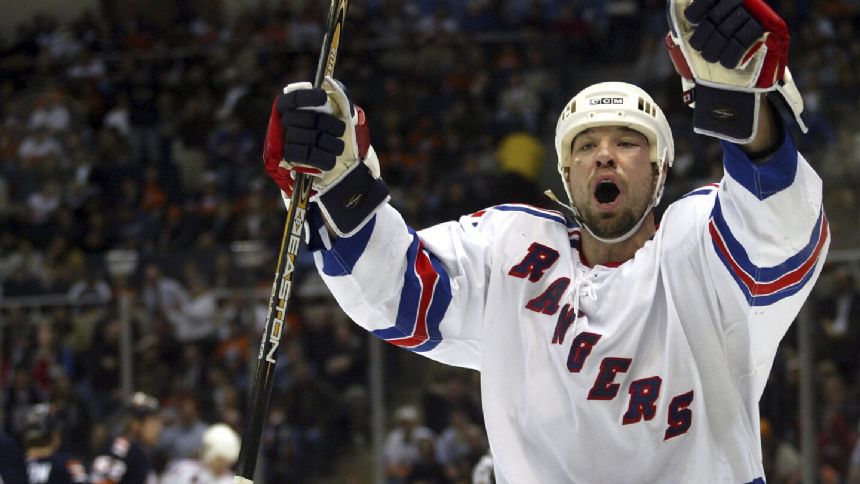 Former NHL enforcer Chris Simon has died at age 52