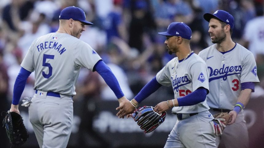 Freeman homers in the 10th inning as the Dodgers beat the Mets 5-2 in doubleheader opener