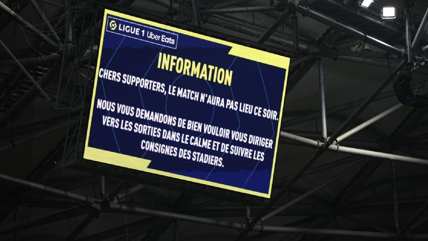 French government says 9 people detained after violent attack on Lyon soccer team buses