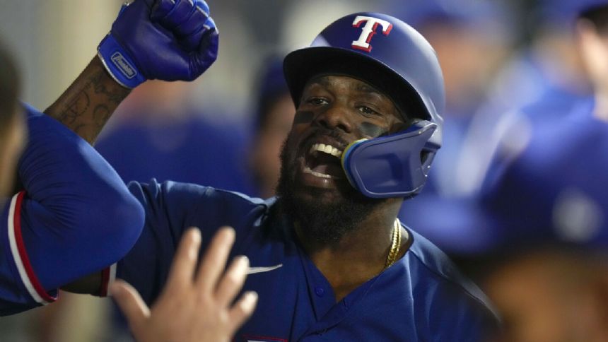 Garcia, Dunning push Rangers to the brink of a playoff berth in a 5-0 win over the Angels