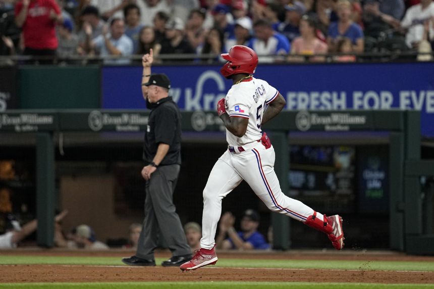 Garcia extends MLB-best RBIs total, Rangers beat Braves 7-4