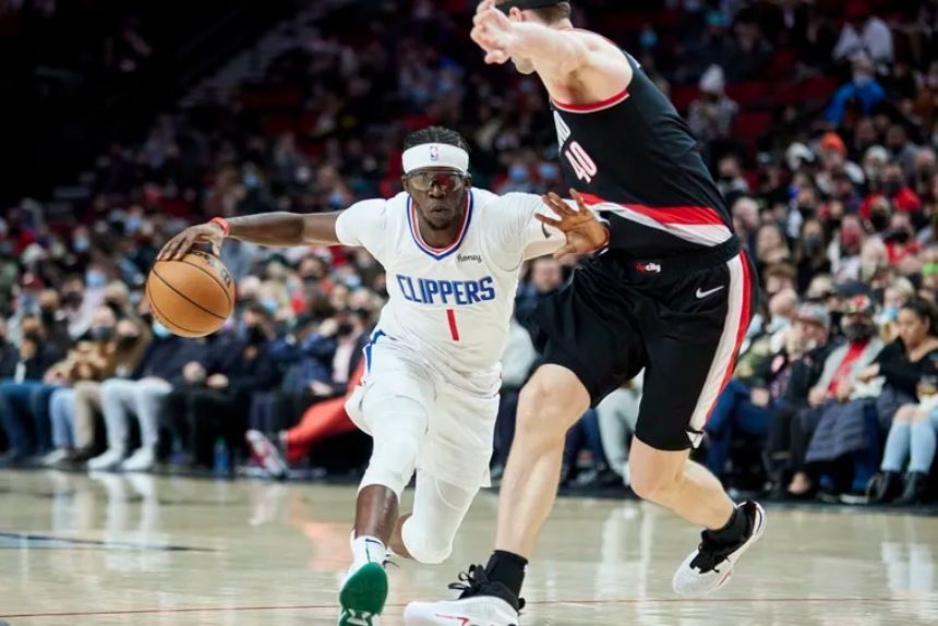 George scores 21 as Clippers down shorthanded Blazers 102-90