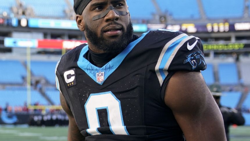 Giants acquiring star rusher Brian Burns from the Panthers, AP source says