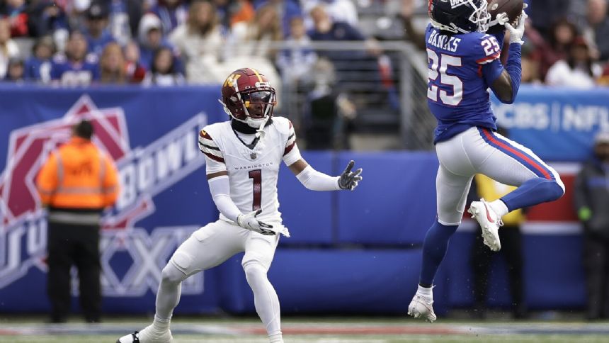 Giants defense stifles Commanders, makes late stand to end 4-game skid in 14-7 win