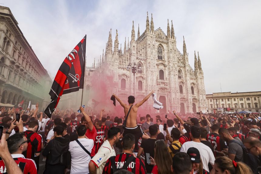 Giroud helps Milan secure 1st Serie A title in 11 years