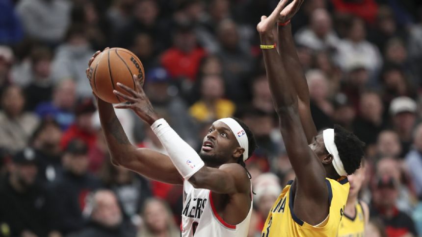 Grant scores 37 points and Trail Blazers down Pacers 118-115 to spoil Siakam's debut