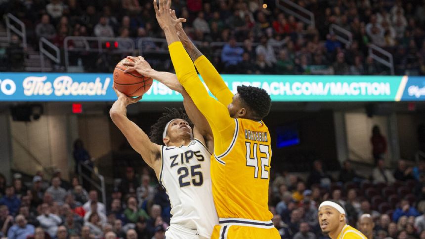 Greg Tribble's two late free throws after Kent State gaffe gives Akron 62-61 win in MAC title game