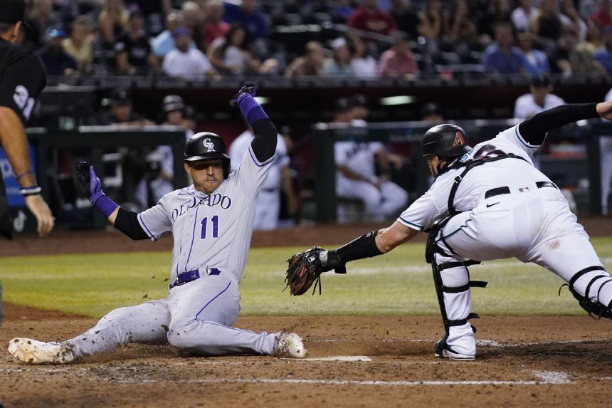 Grichuk hits tiebreaking double in 9th, Rockies beat D-backs