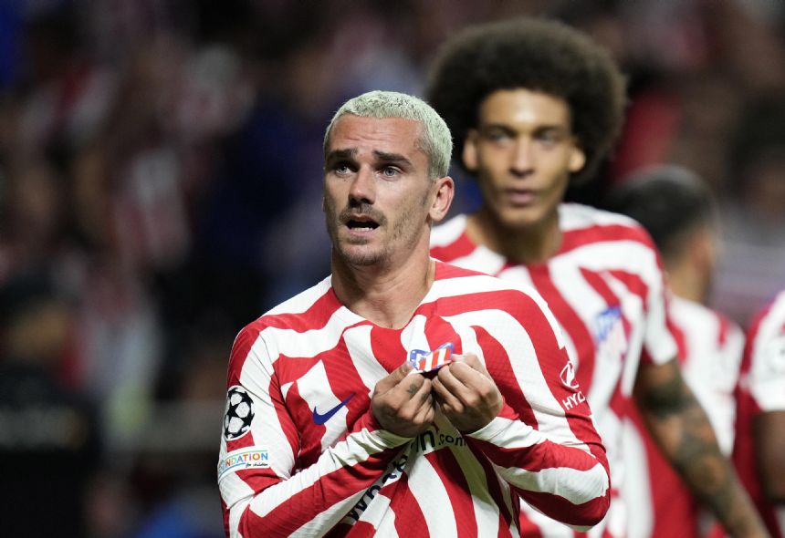 Griezmann goal gives Atletico win v Porto in frenetic finish