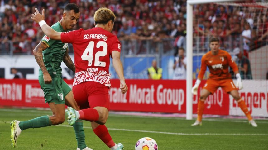 Grifo helps Freiburg snap 3-game winless run in Bundesliga with 2-0 victory over Augsburg