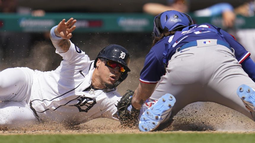 Grossman leads Tigers past Rangers 7-3 for series split