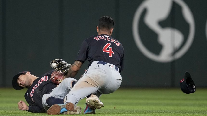 Guardians SS Rocchio and CF Freeman remain in game after hard collision in Texas
