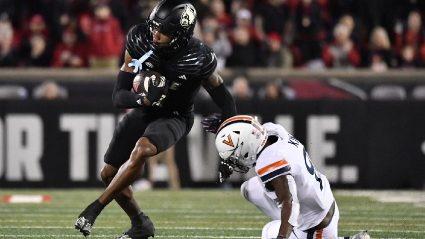 Guerendo's 73-yard TD run helps No. 11 Louisville rally past Virginia 31-24