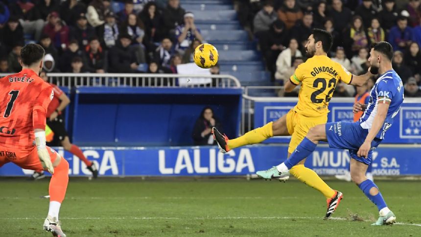 Gundogan leads 10-man Barcelona's 3-1 win at Alaves. Vitor Roque scores before being sent off