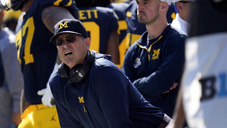 Harbaugh says he'd 'love to' talk about Michigan's sign-stealing investigation, but can't yet