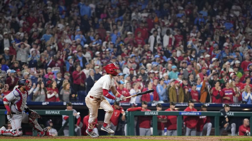 Harper, Clemens lift Phillies to 4-3 win over Nationals in 10 innings