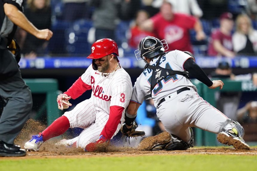 Harper, Phils get gift in 9th, send Miami to 8th loss in row