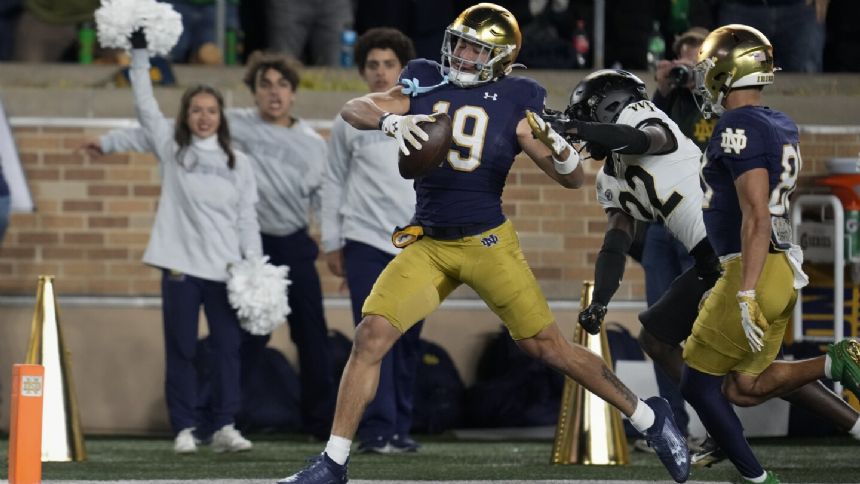 Hartman throws 4 TDs to lead No. 20 Notre Dame to 45-7 win over his former team Wake Forest