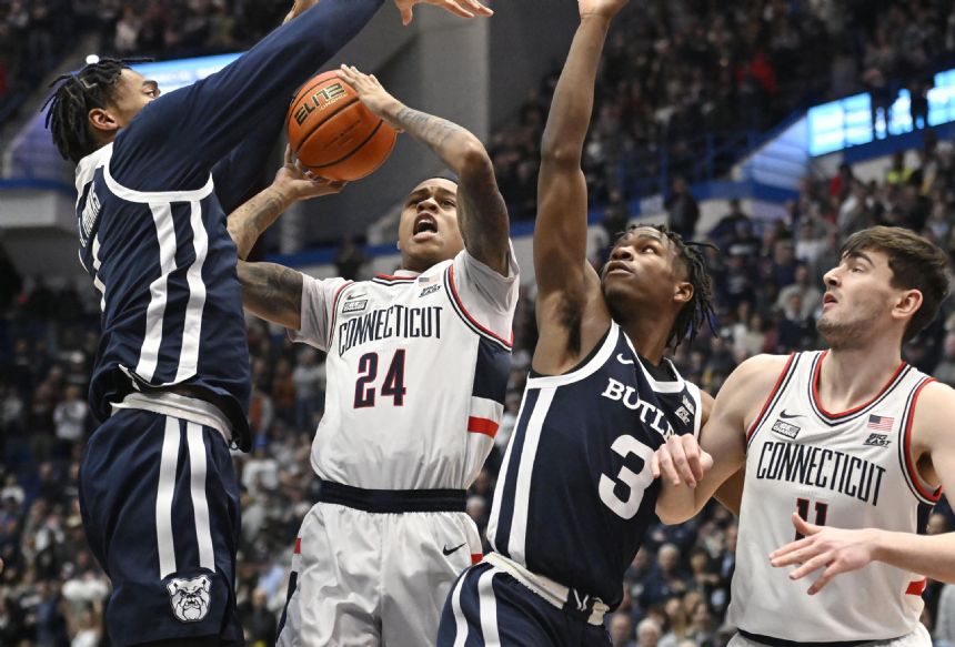 Hawkins, Sanogo lead No. 15 UConn to 86-56 rout of Butler