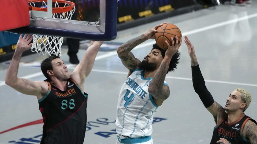 Hayward, Ball lead late Hornets surge past Wizards in their NBA In-Season Tournament debut