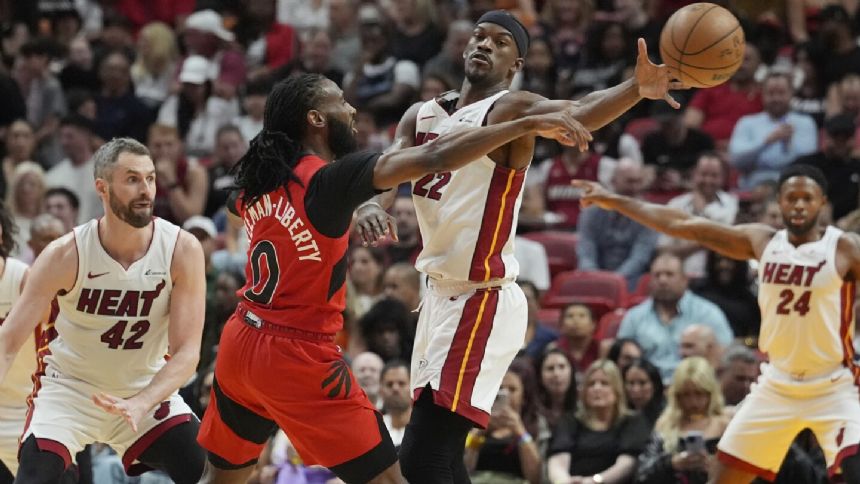 Heat never trail on the way to a 125-103 win over Raptors, keeping playoff hope going