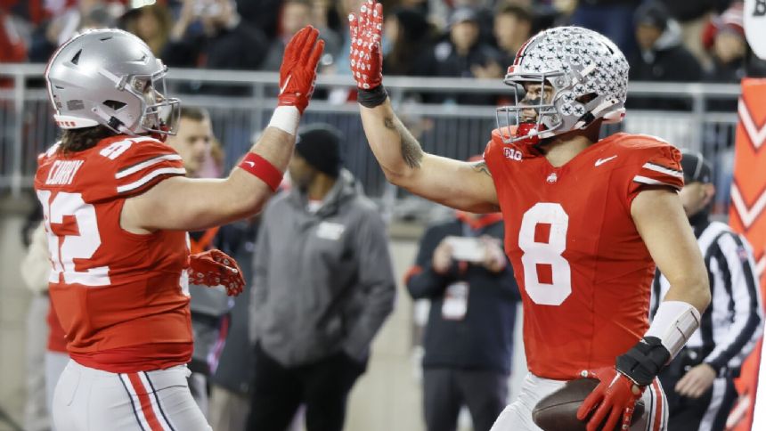 Henderson, McCord combine for 4 TDs as No. 3 Ohio State beats Minnesota 37-3 with Michigan up next