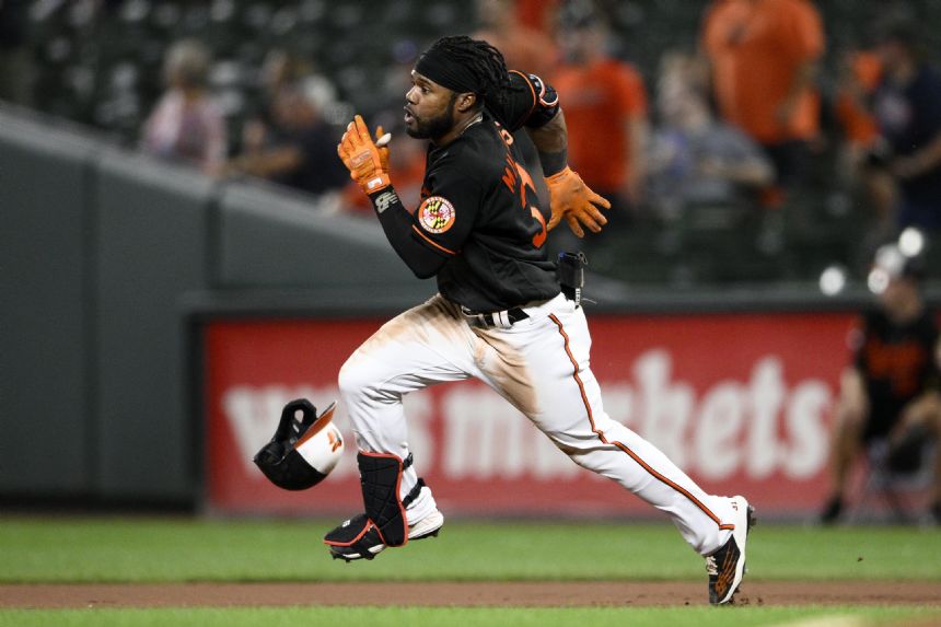 Henderson's big hit helps Orioles rally past Red Sox 3-2