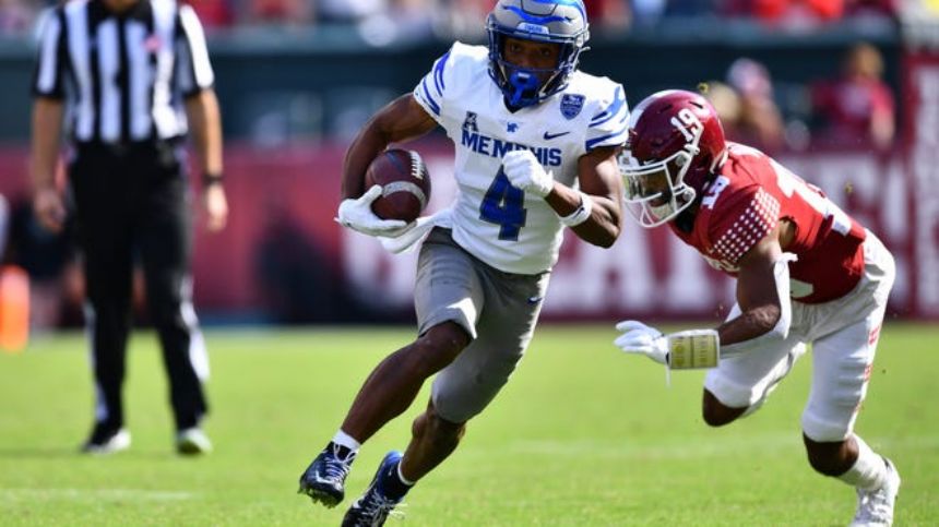 Henigan, Memphis beat Tulane 33-28 to become bowl eligible
