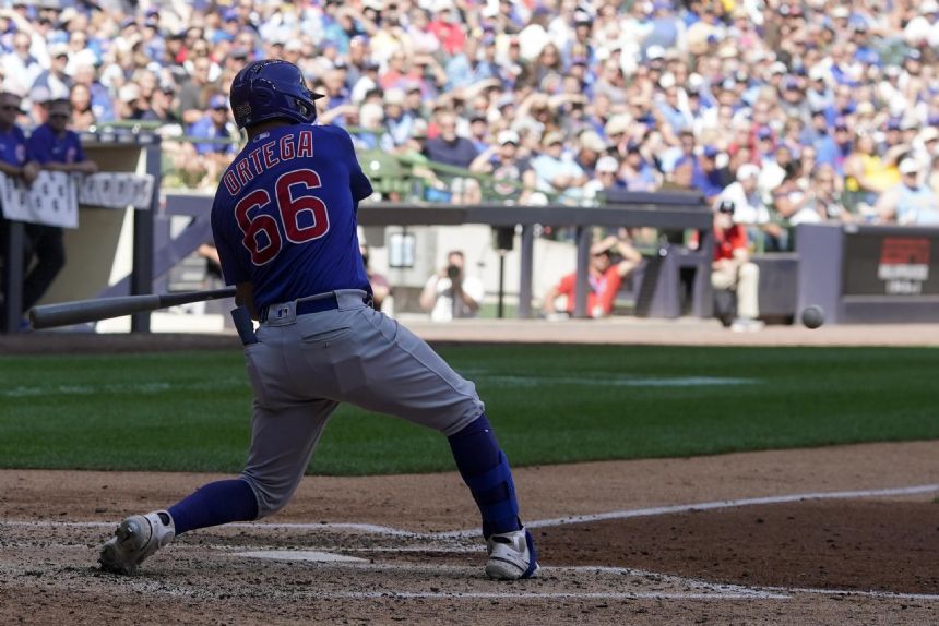 Higgins doubles, Cubs break through to beat Hader, Brewers