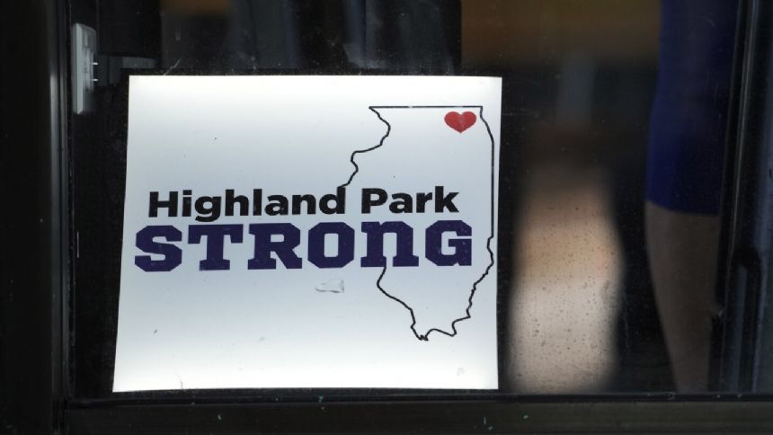Highland Park marks 1 year after July 4 shooting with community walk reclaiming parade route