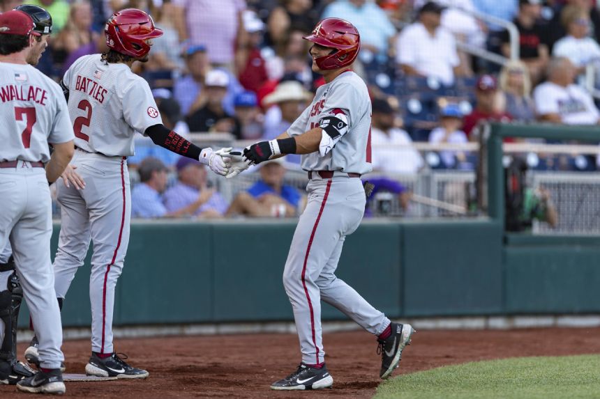 Hogs hang on to beat Ole Miss, force 2nd CWS bracket final