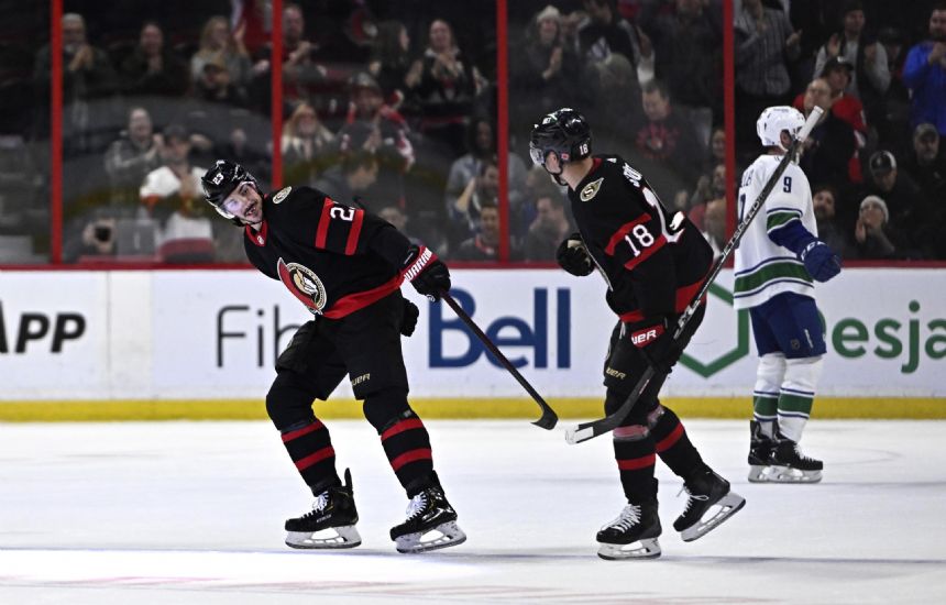 Horvat scores 2 to lead Canucks to 6-4 win over Senators