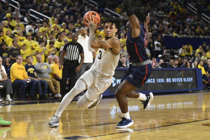 Howard scores 19, Michigan turns back Jackson State 78-68